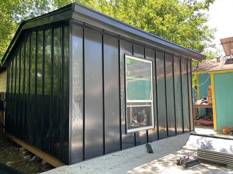 Black standing seam metal wall panels for Roof Inspection in Riverton